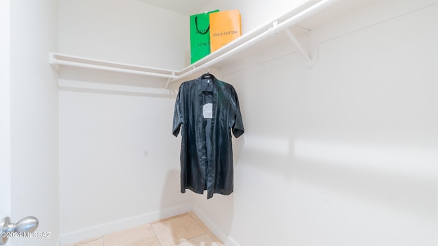 walk in closet featuring tile patterned floors