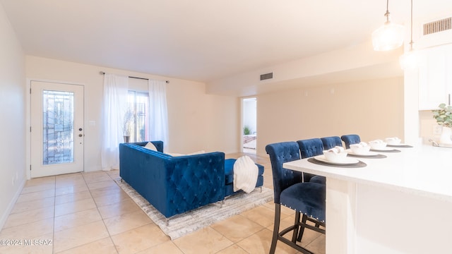 living room featuring light tile patterned floors