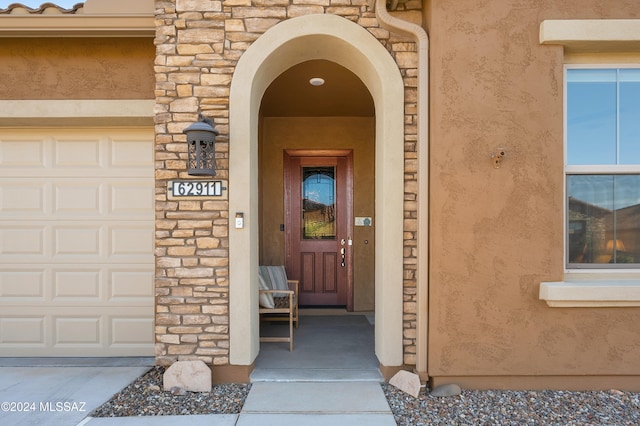 entrance to property with a garage