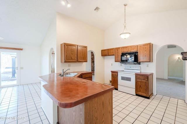 kitchen featuring light tile patterned flooring, sink, high vaulted ceiling, white range with electric cooktop, and pendant lighting