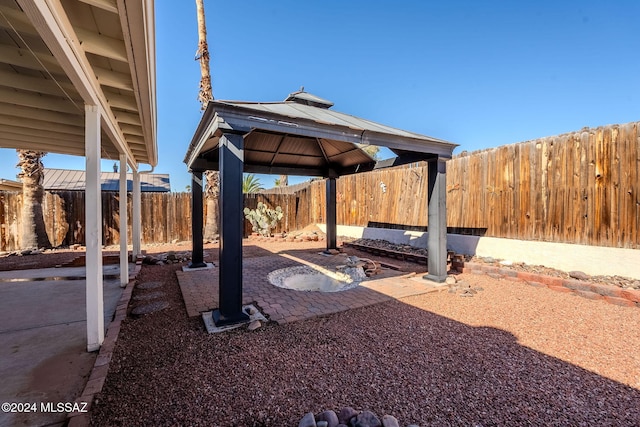 view of yard featuring a gazebo and a patio area