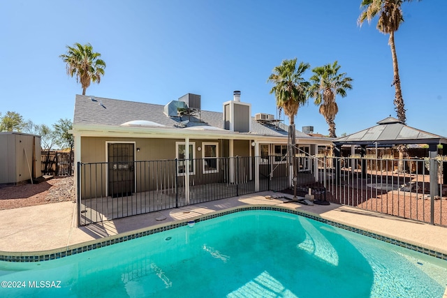 view of pool featuring a patio and a gazebo