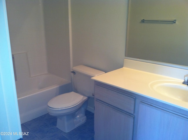 full bathroom featuring vanity, tile patterned floors, toilet, and  shower combination