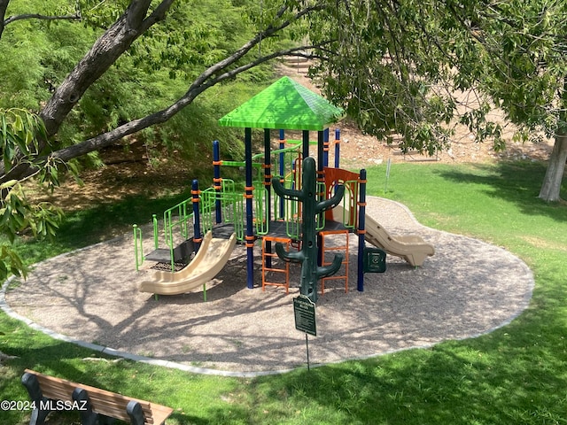 view of playground featuring a yard