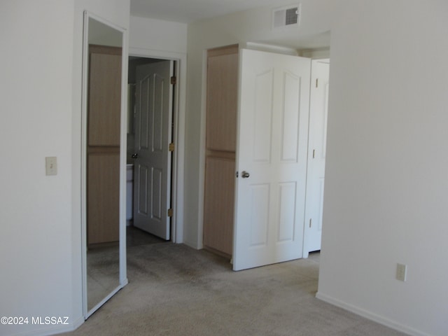 interior space with light colored carpet