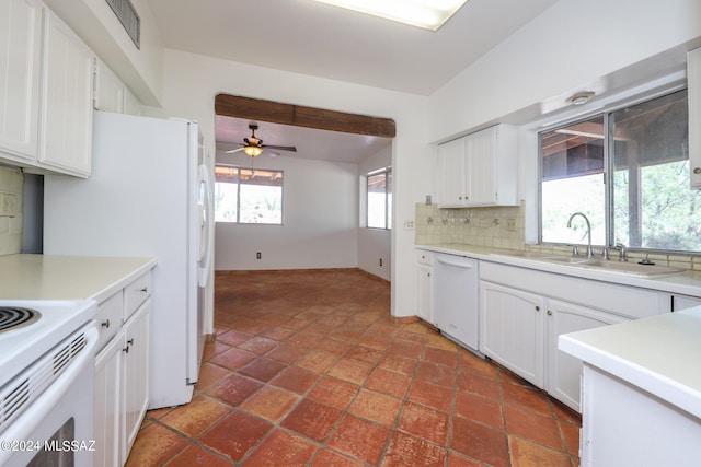 kitchen featuring ceiling fan, sink, tasteful backsplash, white appliances, and white cabinets