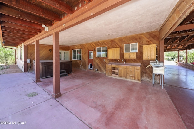 view of patio with a hot tub