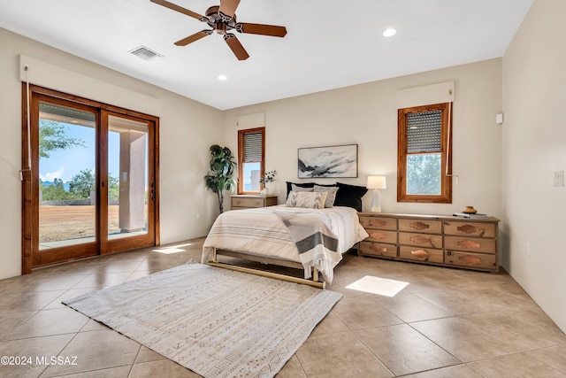 bedroom with access to exterior, light tile patterned floors, visible vents, and recessed lighting