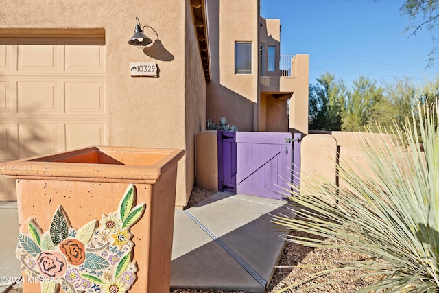 view of side of property featuring a balcony