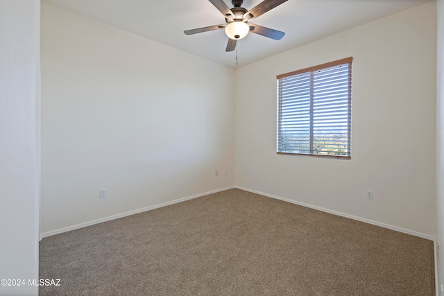 carpeted empty room with ceiling fan