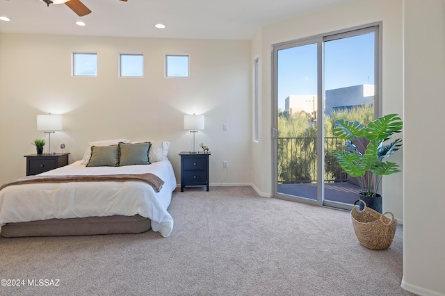 carpeted bedroom featuring access to outside and ceiling fan