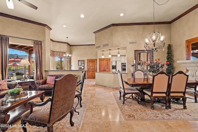 dining room featuring a high ceiling, a chandelier, and crown molding