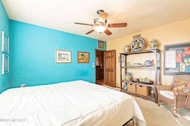 bedroom featuring carpet and ceiling fan