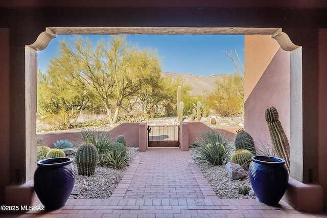 view of patio / terrace with a mountain view