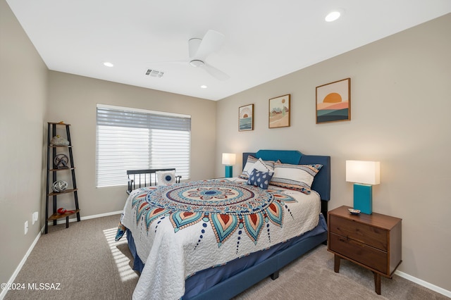 carpeted bedroom with ceiling fan