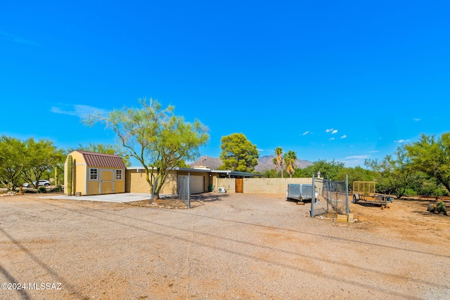 exterior space with a storage unit