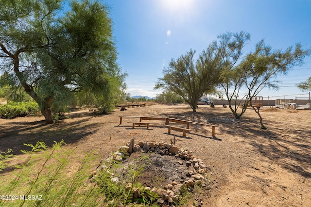 view of yard with a rural view