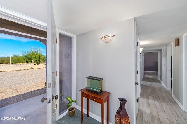 doorway featuring hardwood / wood-style floors