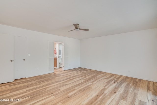 unfurnished bedroom featuring ceiling fan and light hardwood / wood-style flooring