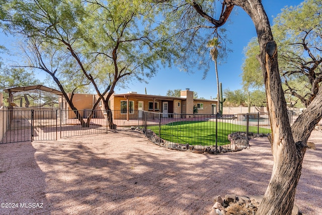 view of front of property with a front lawn