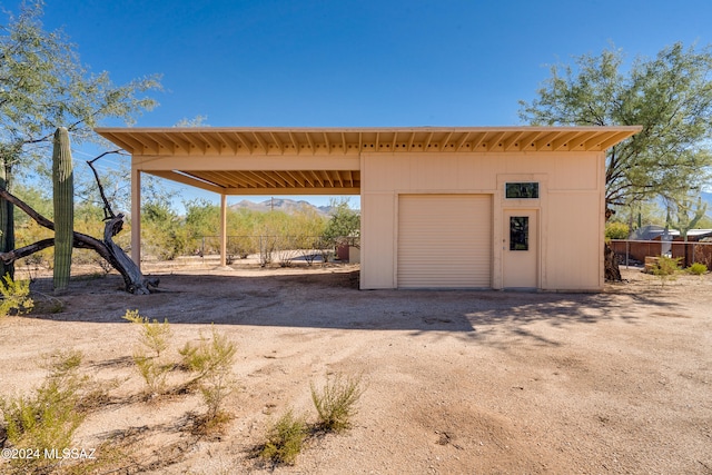 garage featuring a carport