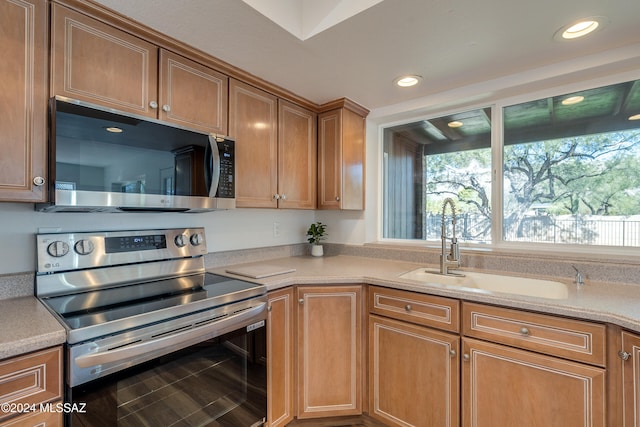 kitchen featuring stainless steel appliances and sink