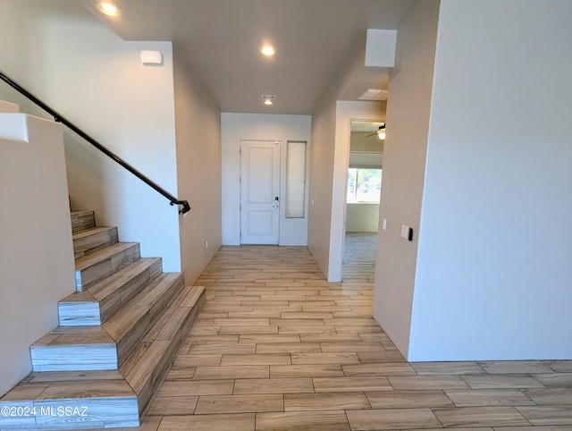 hall with light hardwood / wood-style flooring