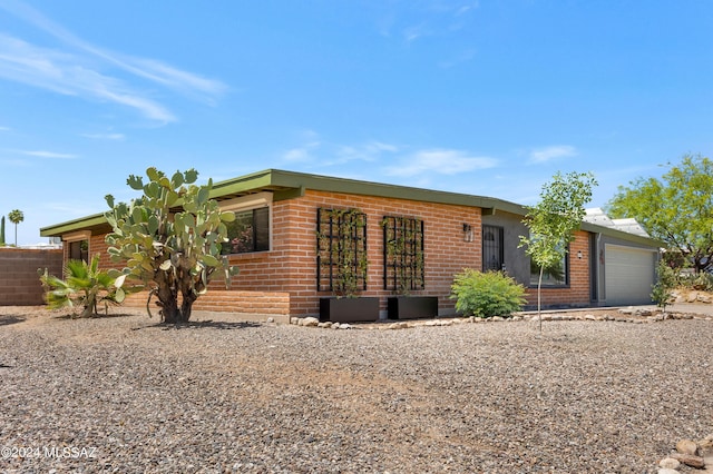 single story home with a garage