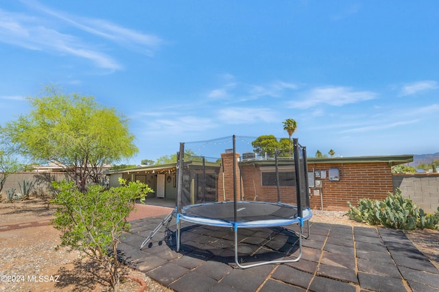 view of patio with a trampoline