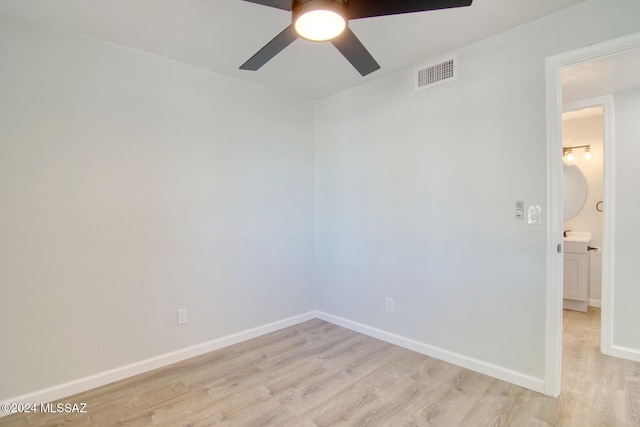 unfurnished room with light hardwood / wood-style floors and ceiling fan