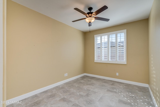 spare room featuring ceiling fan