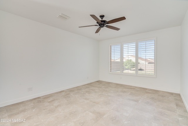 empty room featuring ceiling fan