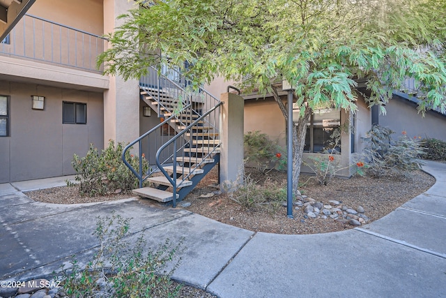 view of home's exterior with a balcony