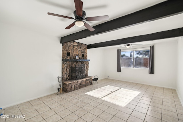 unfurnished living room featuring beam ceiling, ceiling fan, a fireplace, and light tile patterned floors