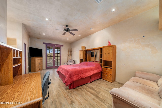 bedroom featuring french doors, light hardwood / wood-style floors, and ceiling fan