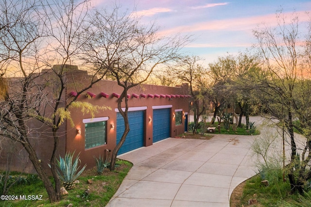 view of front of house with a garage