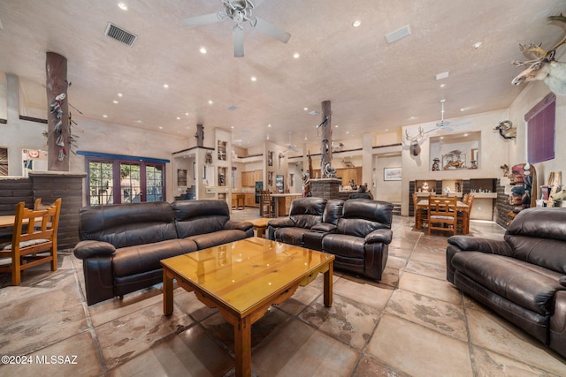 living room featuring ceiling fan