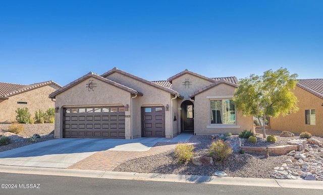 view of front of property featuring a garage