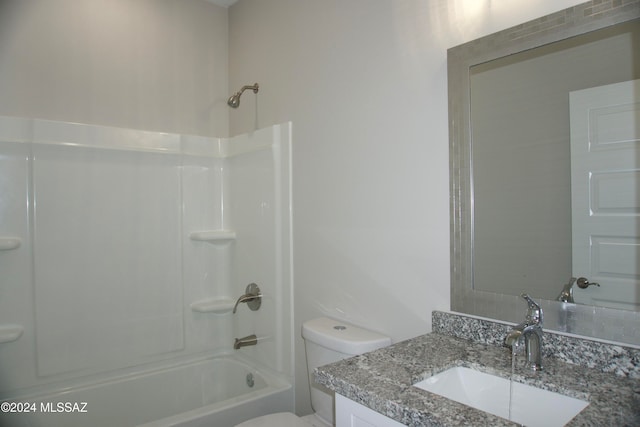 full bathroom with toilet, vanity, and bathing tub / shower combination