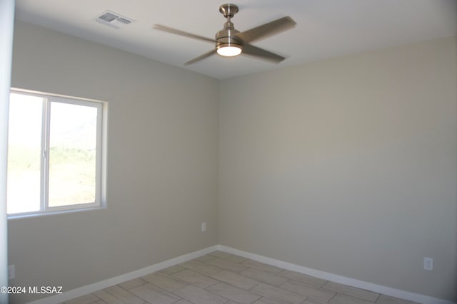 unfurnished room featuring ceiling fan