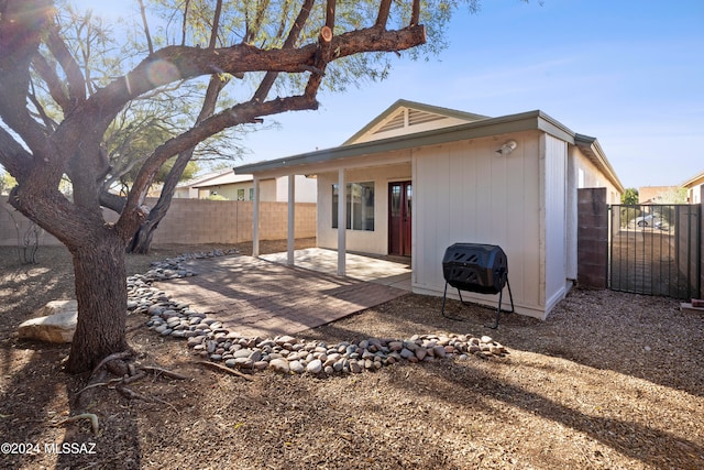 rear view of house with a patio area