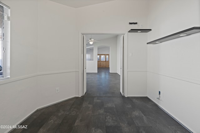 hall featuring dark wood-type flooring