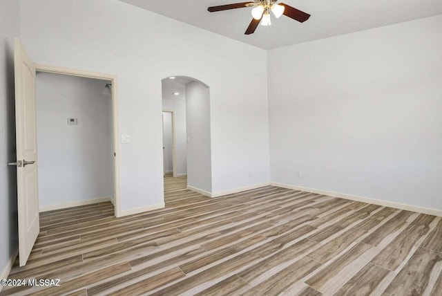 unfurnished bedroom with wood-type flooring and ceiling fan