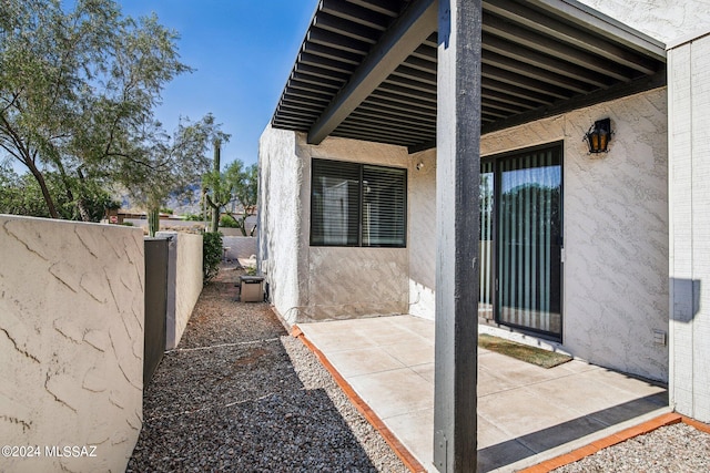 view of home's exterior with a patio area