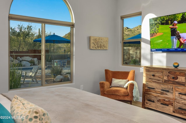 bedroom with hardwood / wood-style flooring