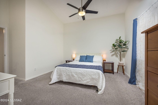 carpeted bedroom with lofted ceiling and ceiling fan