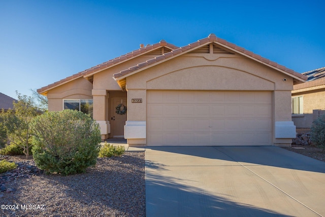 view of front of property with a garage