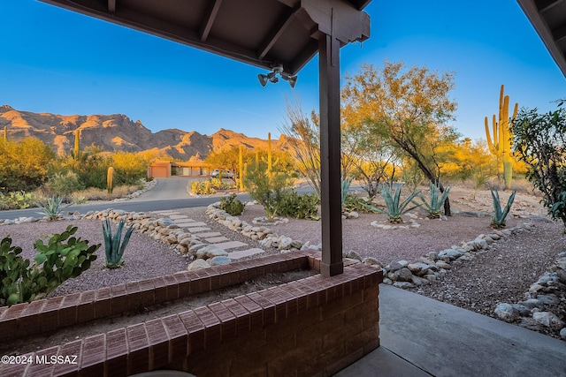 view of patio / terrace with a mountain view