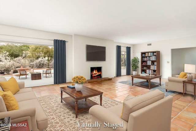 living room featuring light tile patterned floors