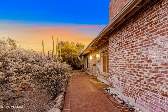 view of property exterior at dusk